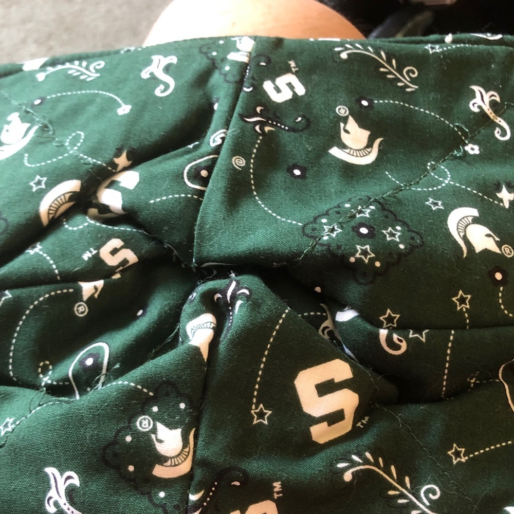 Green Printed Quilted Fabric with White 'S' & Motif